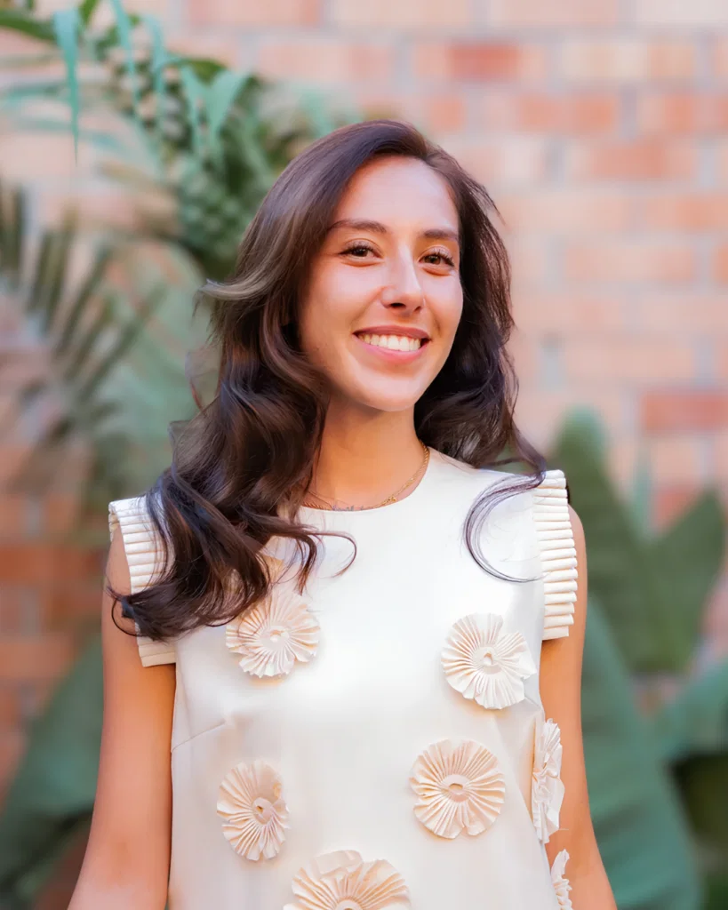Professional hair stylist providing hair styling services at CMX Beauty salon in Burlingame